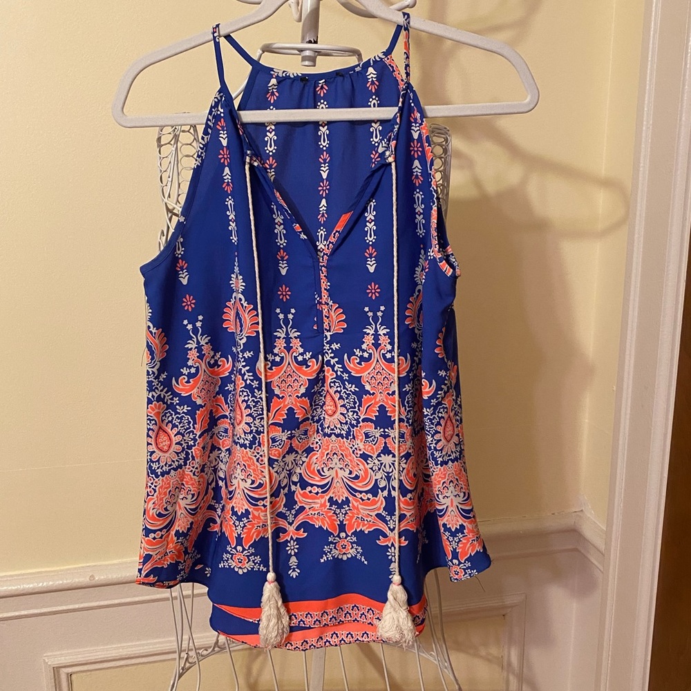 Beautiful orange and blue sleeveless blouse